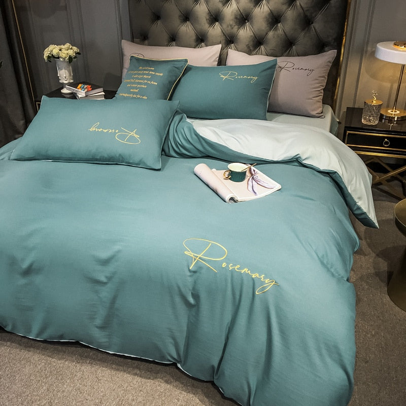 Juego De Sábanas Liso Con Inscripción Bordada En Azul Y Verde